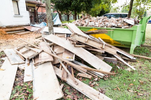 Professionals performing flat clearance in Northolt
